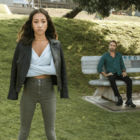 A couple looking upset in the park