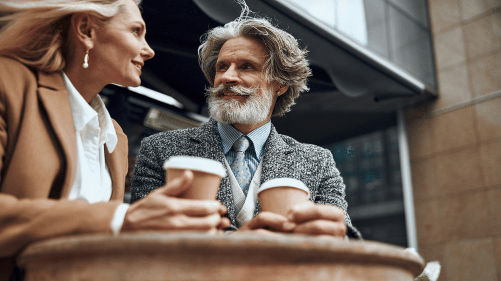 A beautiful mature couple having coffee together