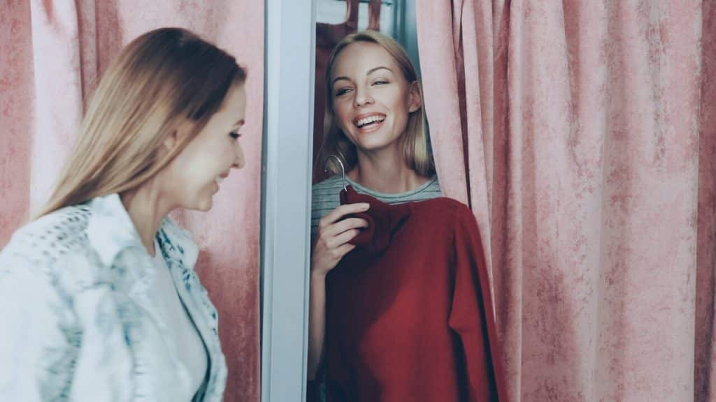 A woman trying on clothes