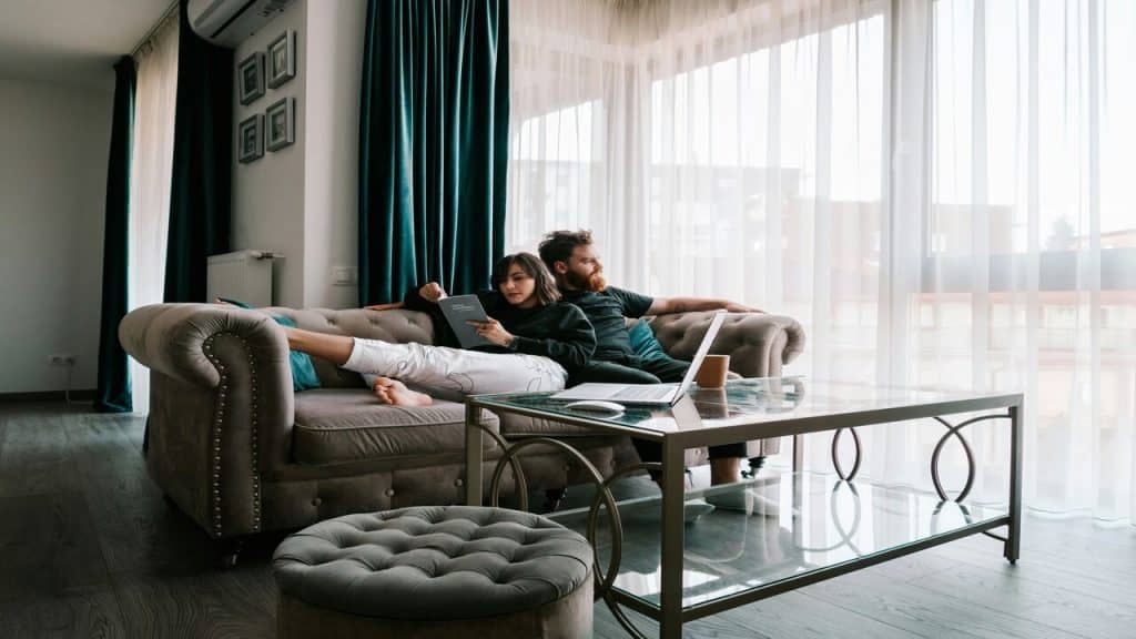 A couple relaxing on the couch