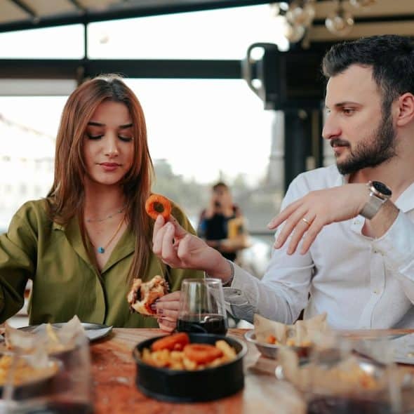 A man and woman talking