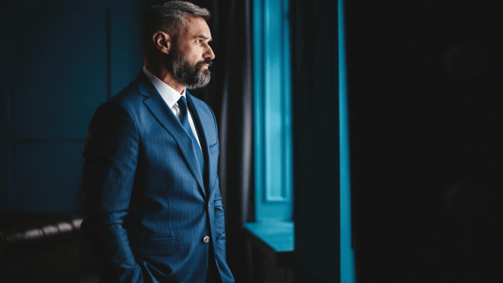 A man looking out the window