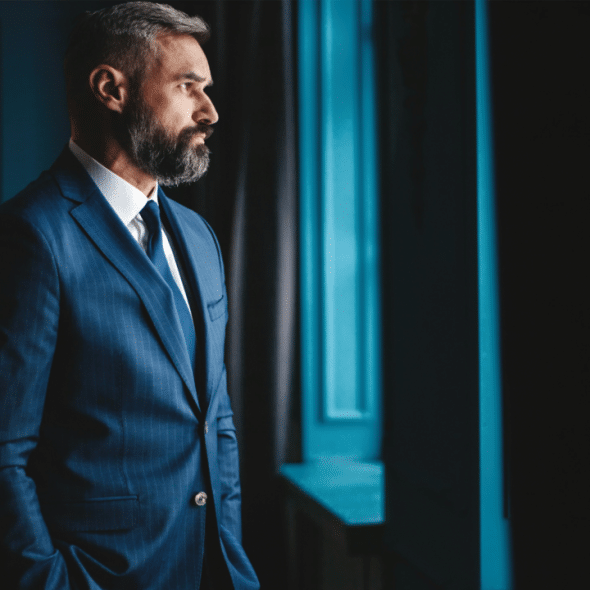 A man looking out the window