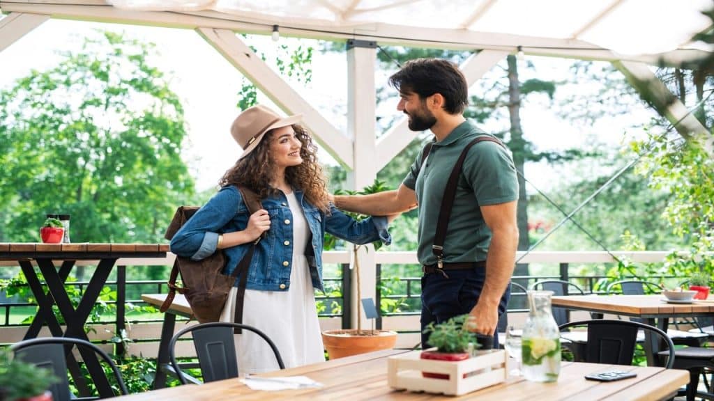 A couple at a terrace restaurant