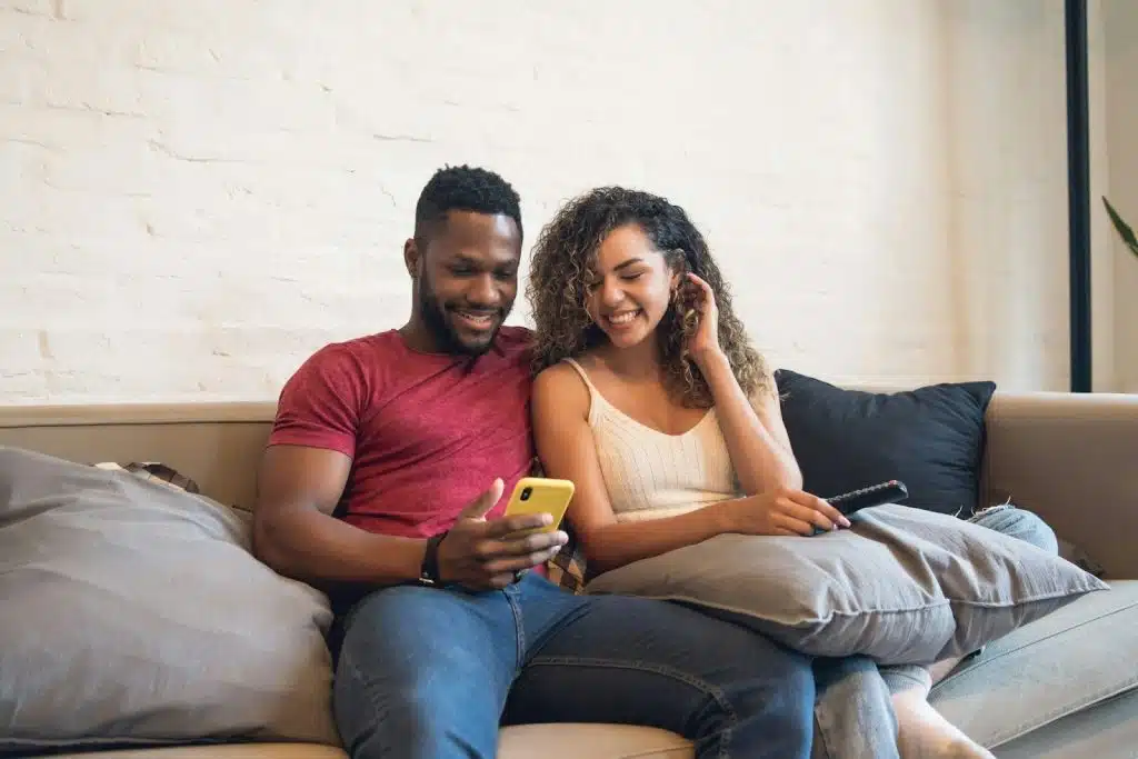 A man and woman at the couch