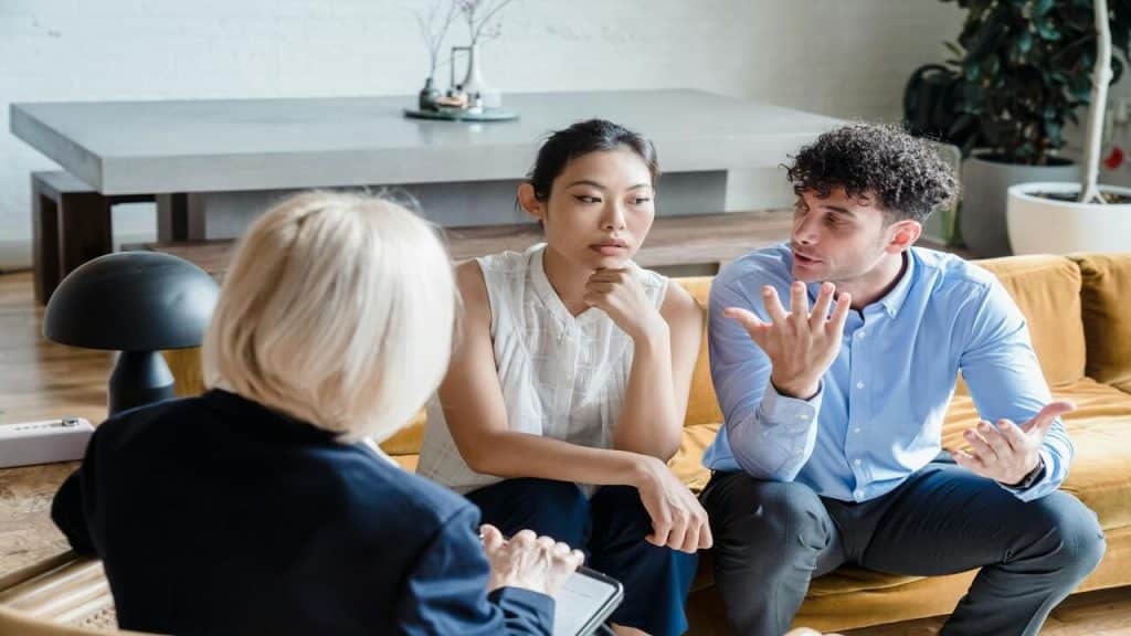 A couple arguing while in therapy