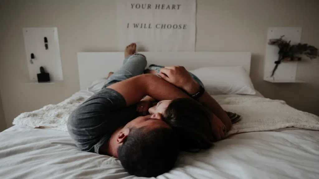 A couple cuddling at home
