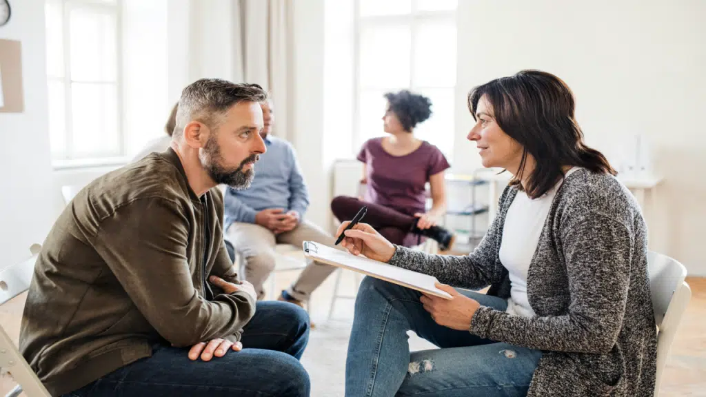 A mature man in group therapy