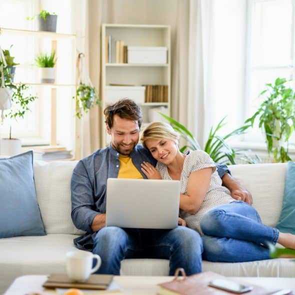 A man and woman at the living room