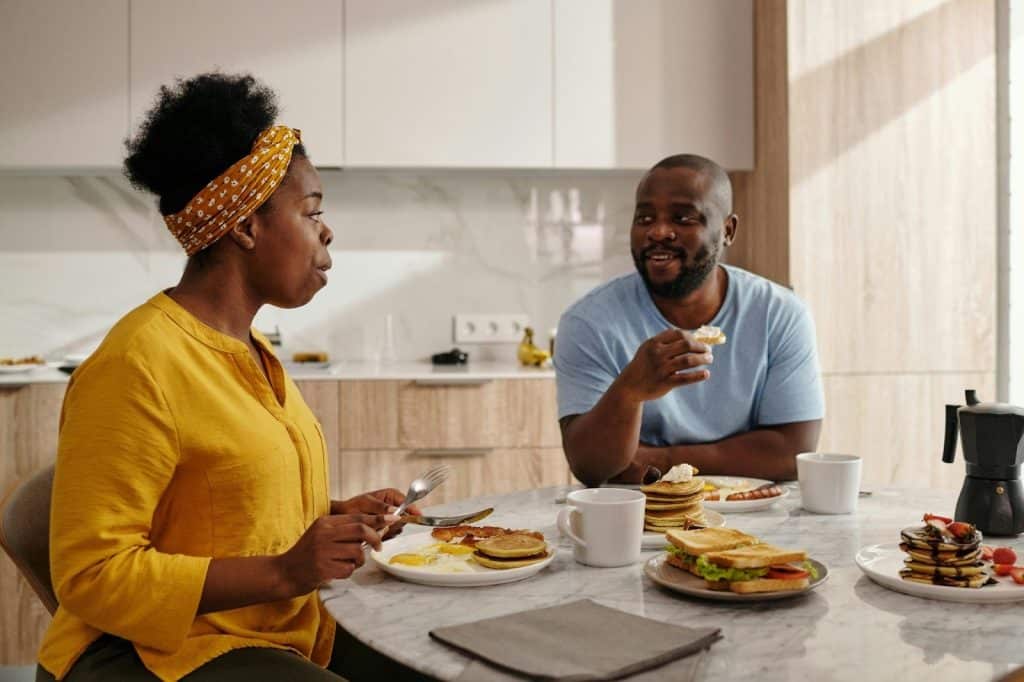 A man and woman having a breakfast together