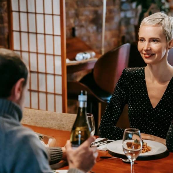 A man and woman talking