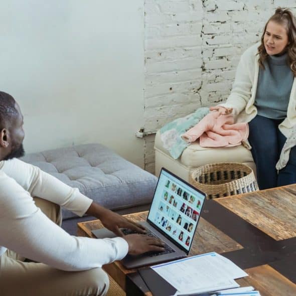 A woman talking to a man