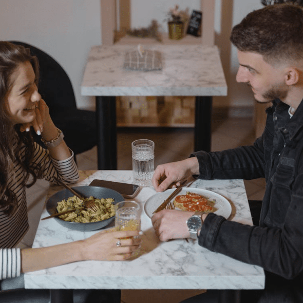 Man and woman having a date in a restaurant