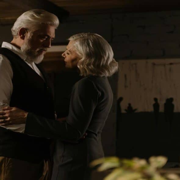 A couple looking at each other at home