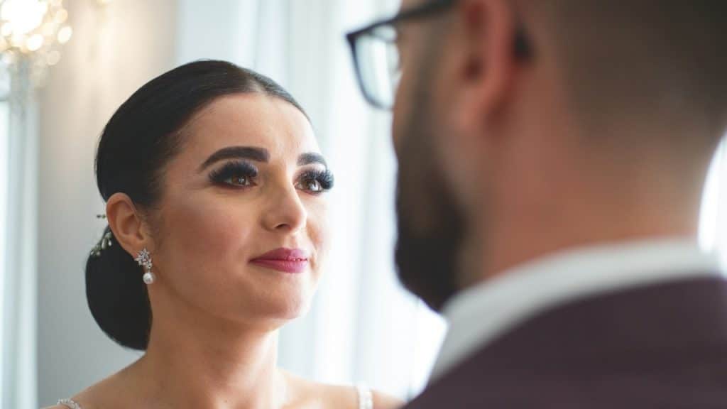 A woman looking at her husband with love.