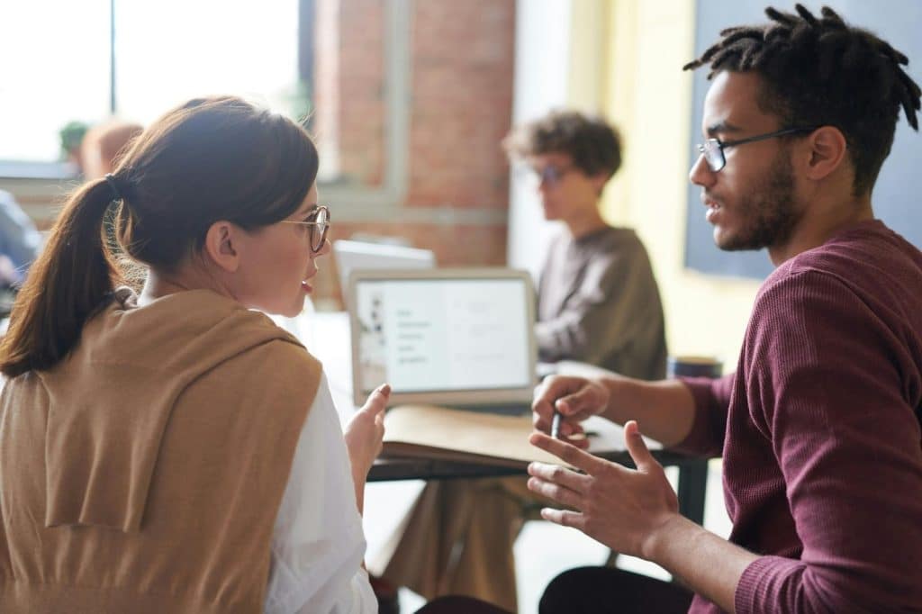 A man and a woman talking