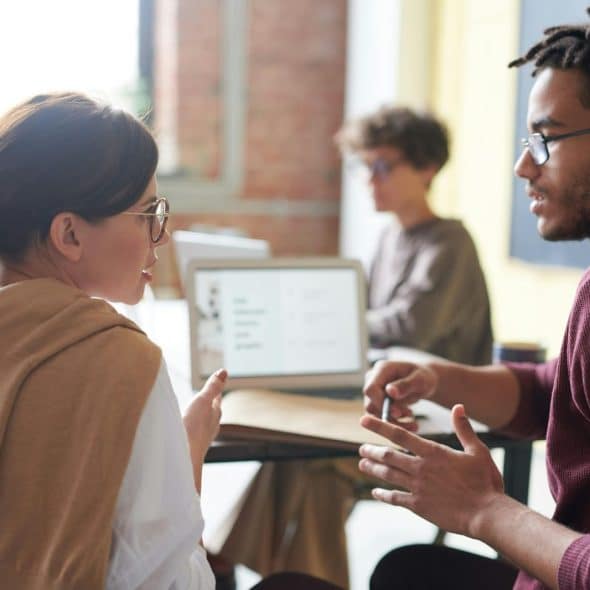 A man and a woman talking