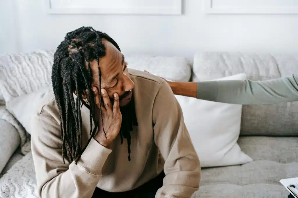 A man looking at the woman