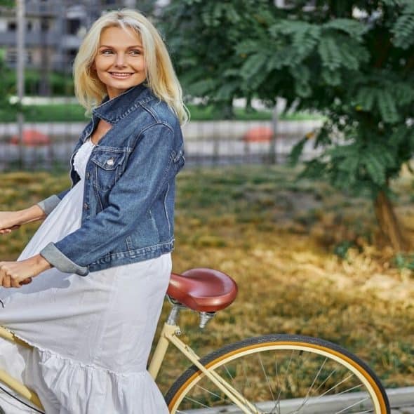 A woman looking happy by herself