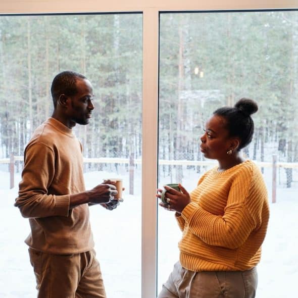 A man and woman looking at each other