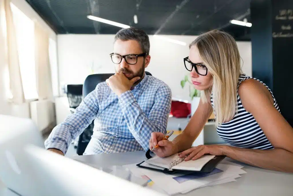 A man and woman working together
