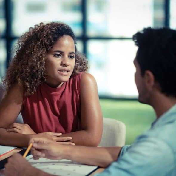 A man and woman talking
