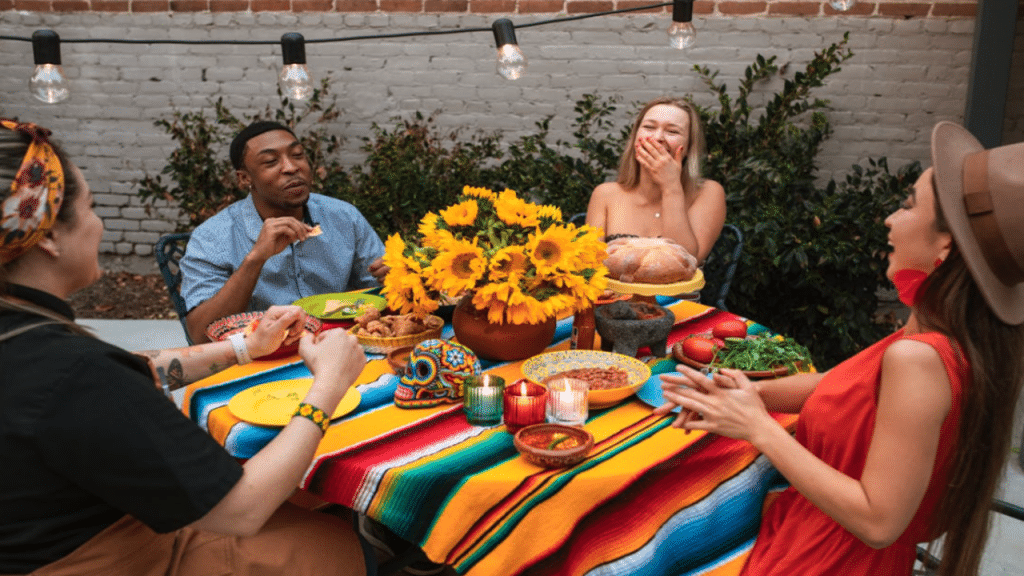 Friends laughing during a meal