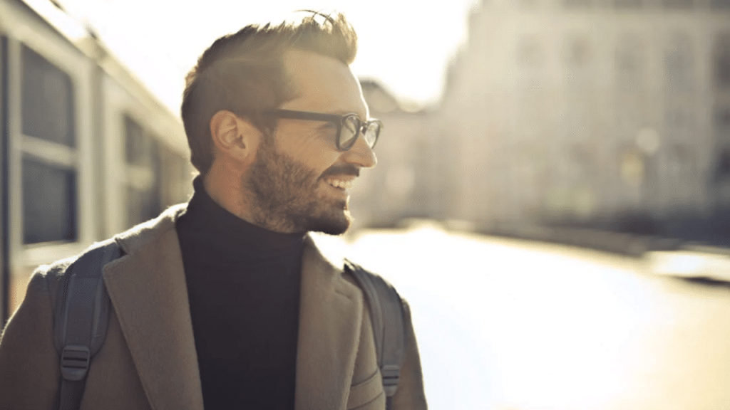A man smiling outdoors