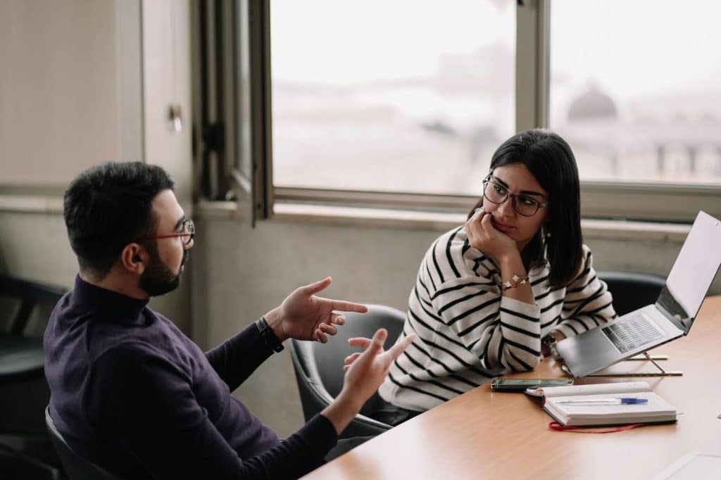 A man and woman having a conversation