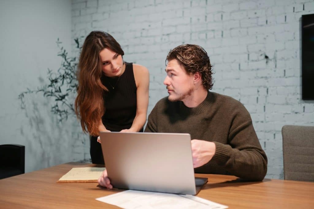 A man and woman looking at each other