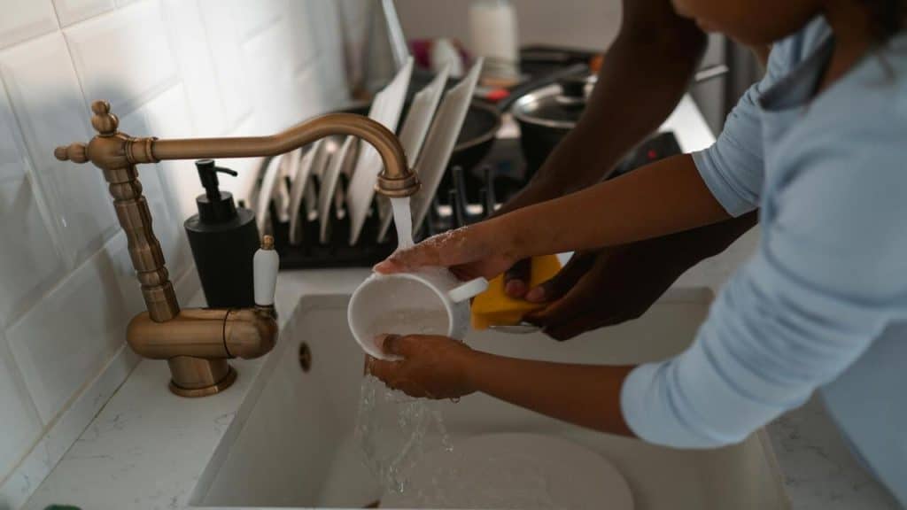 A couple doing the dishes together