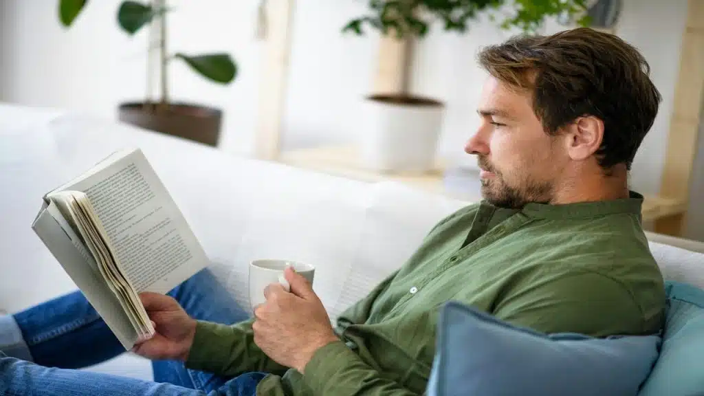 A man reading by himself