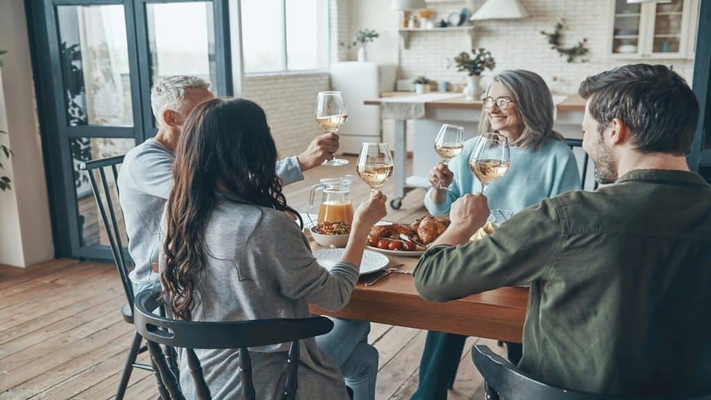 A couple having a meal with the in-laws 