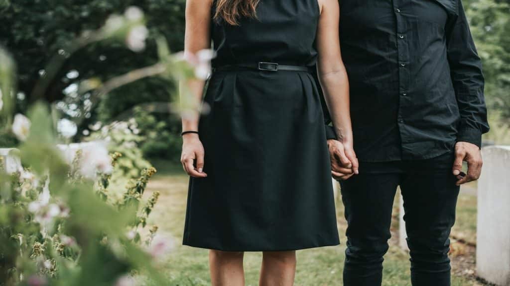 A couple at a funeral