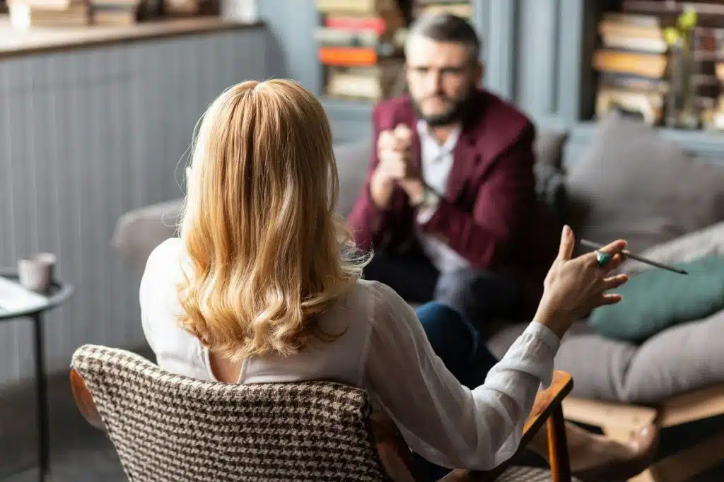 A man and woman talking