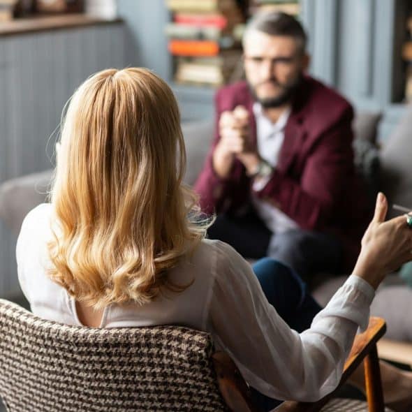 A man and woman talking