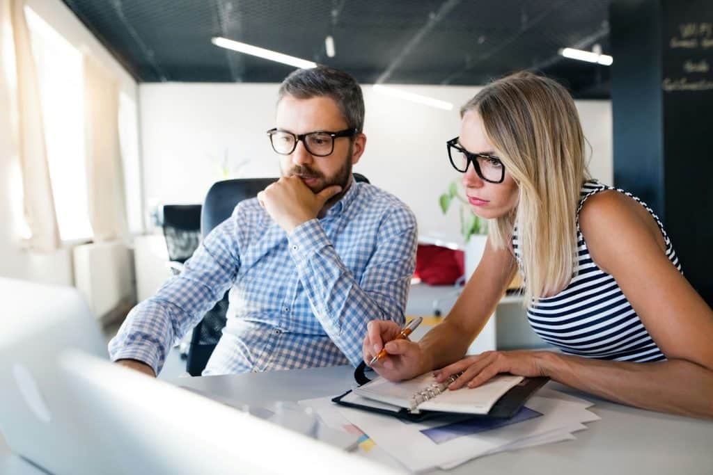 A man and woman working together