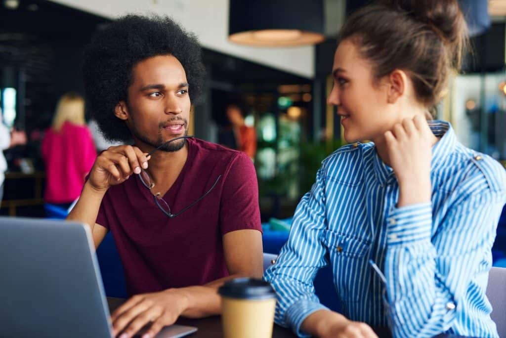 A man staring at the woman’s face 