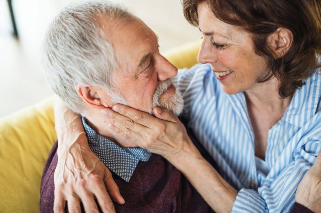 A man and woman close to each other