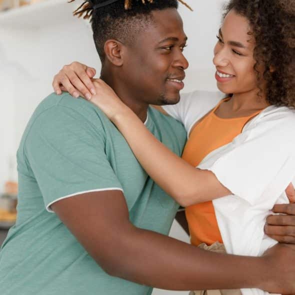 A man and woman close to each other