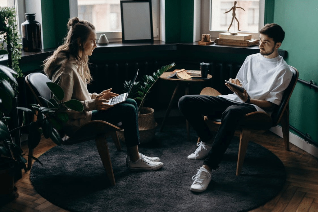 A man and woman talking to each other