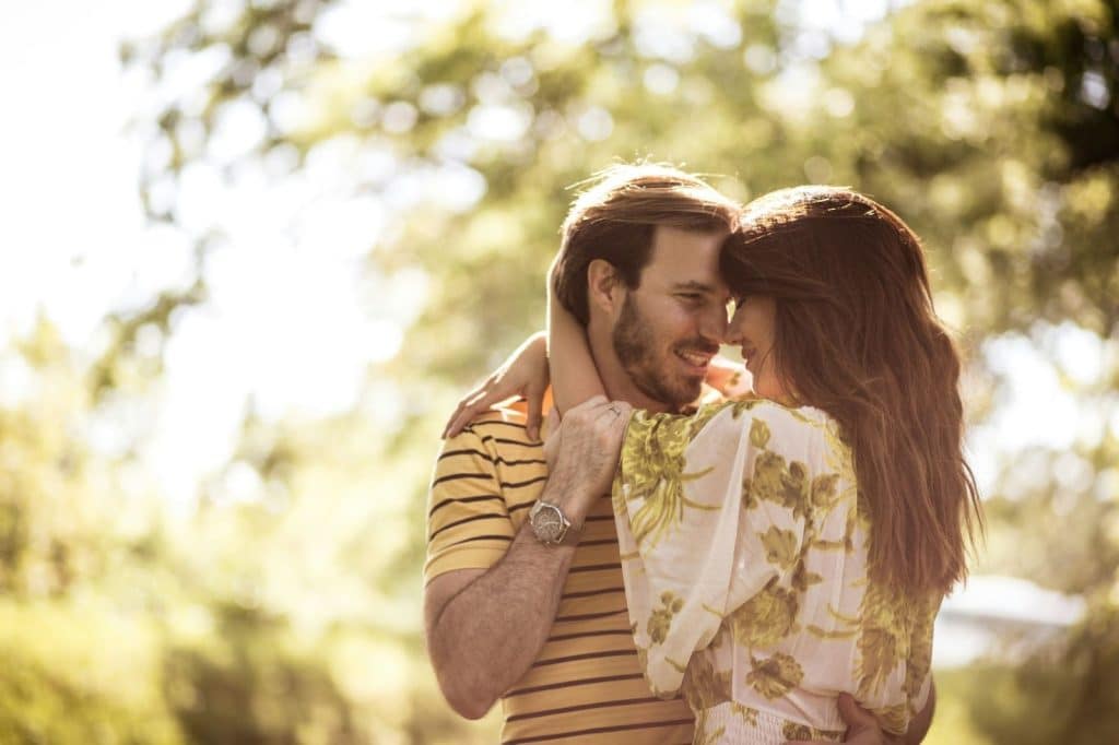 A picture of a man and woman being sweet
