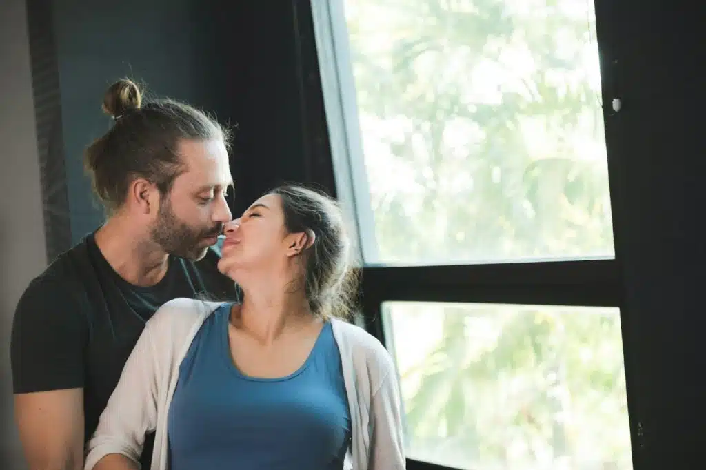 A man hugging a woman