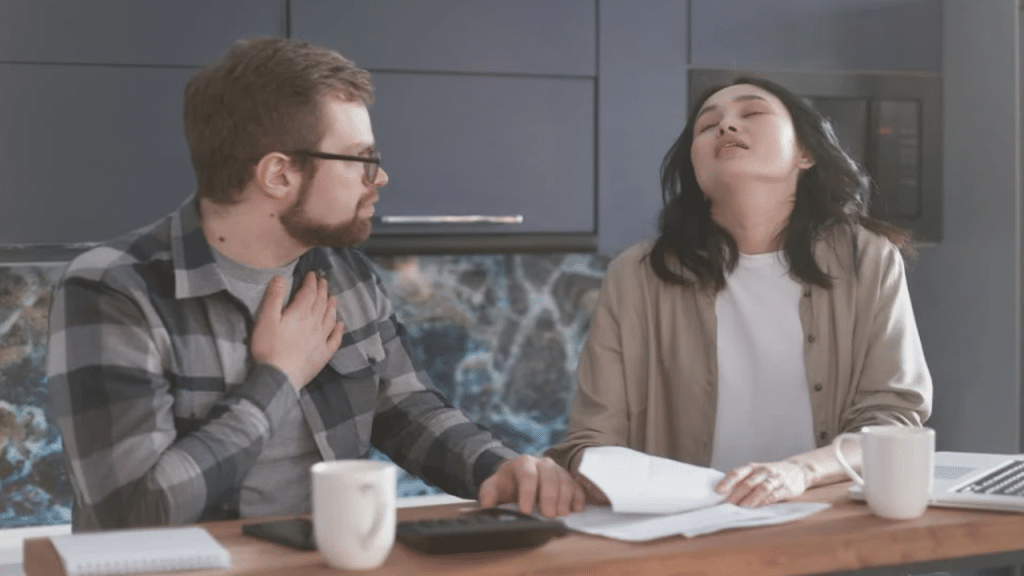 A couple fighting over the bills