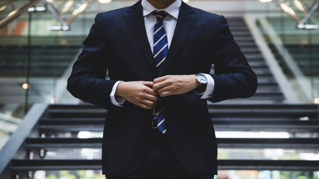A man wearing a suit at work