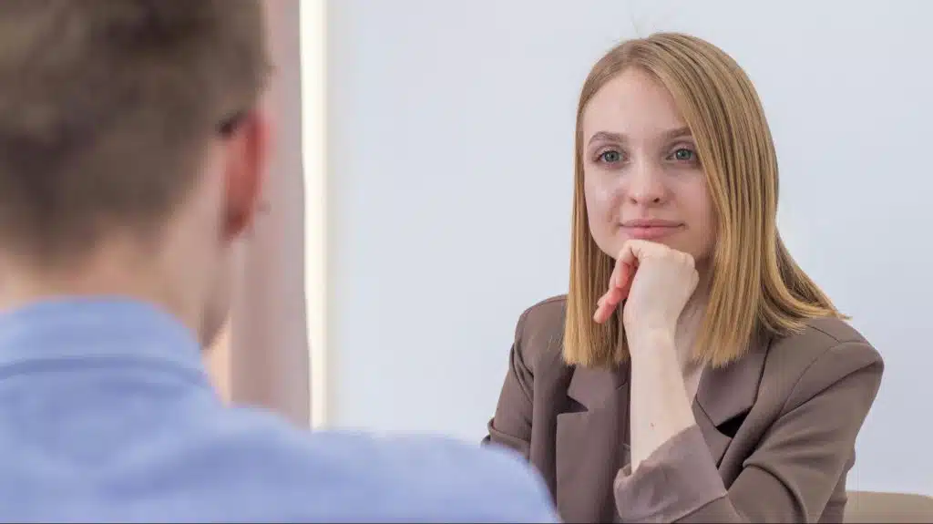 A man and woman looking at each other