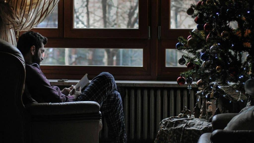 A man sitting on sofa chair