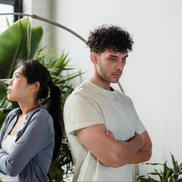 A man and woman back to back