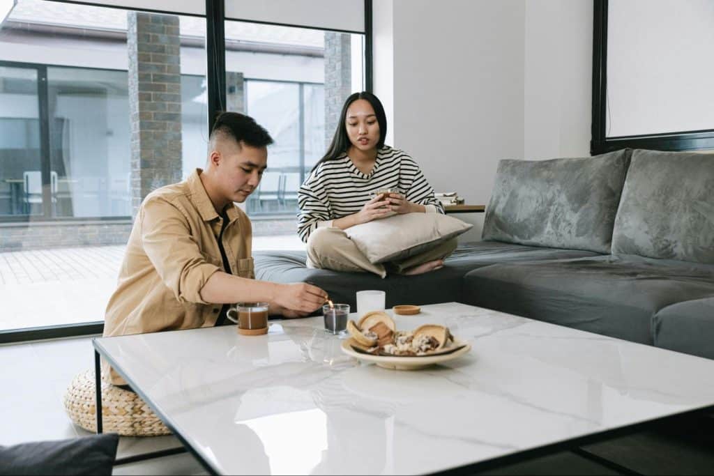 A man and woman at the living room