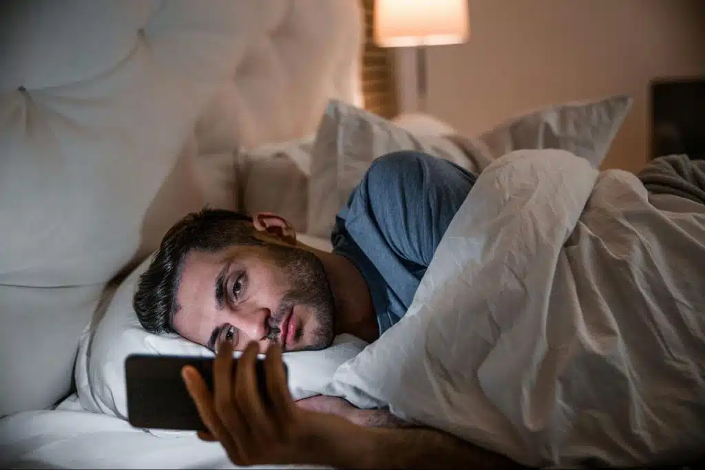 A man spending his time to use phone